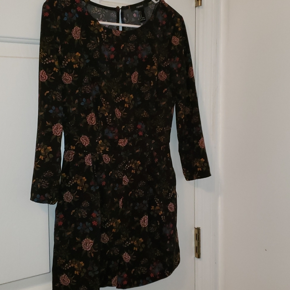 tight floral romper with *pockets*